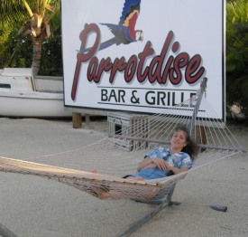 Parrotdise Bar & Grille,Jackie in  a hammock swing